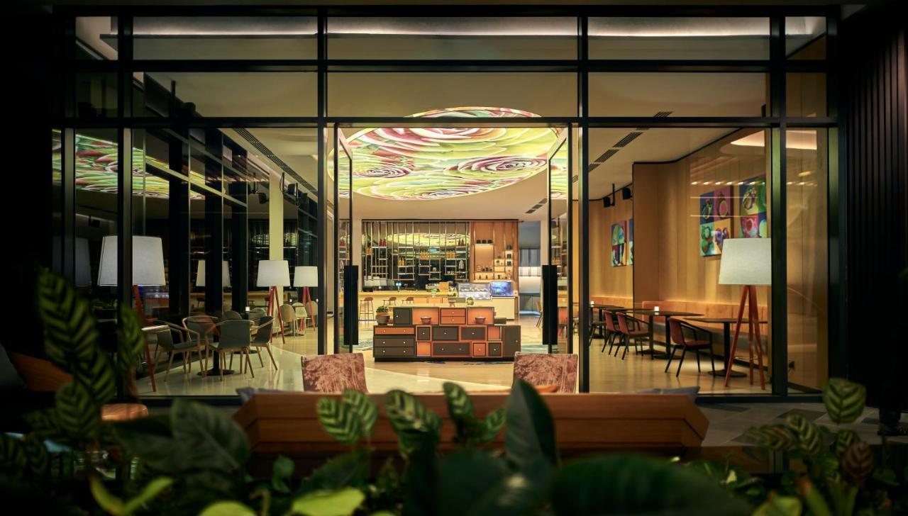 Amari Kuala Lumpur Hotel Exterior foto The lobby lounge
